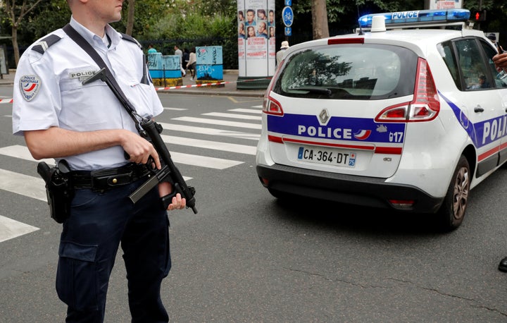 French police secure the area next to the Saint-Leu church during a security operation on Saturday in a shopping district of Paris, France, September 17, 2016.