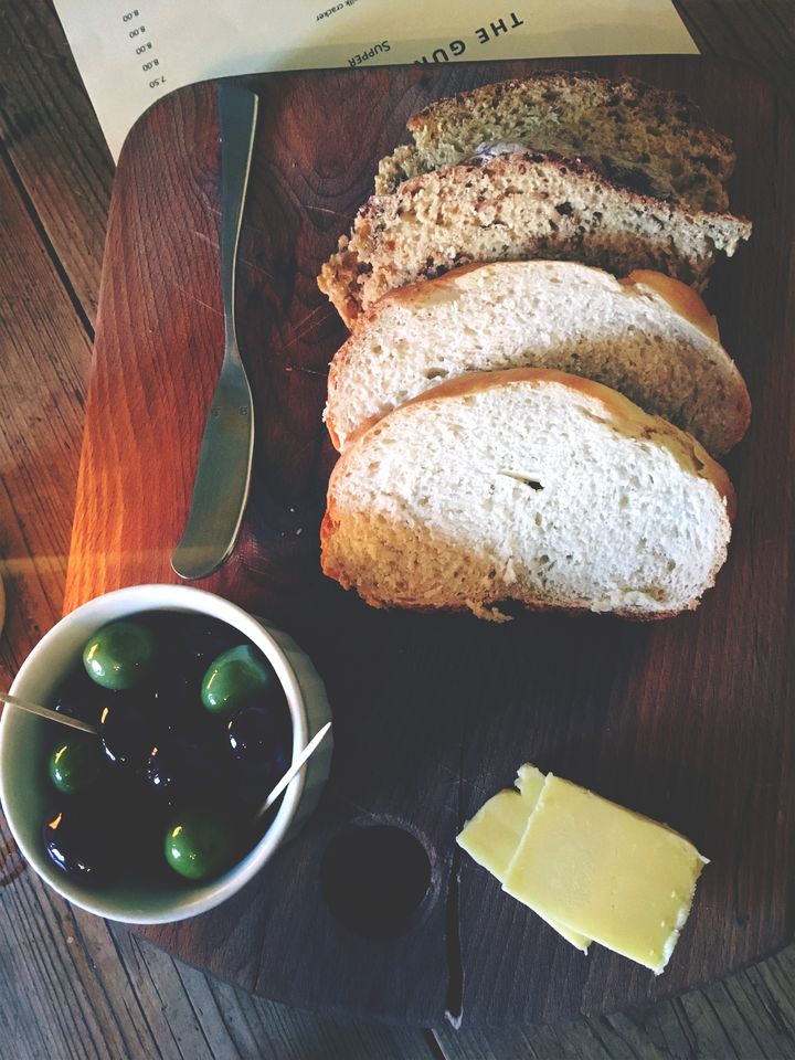 Olives, local olive oil, butter & warm bread