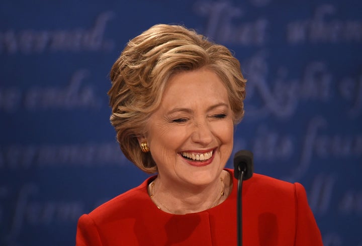 Hillary Clinton, laughing in the face of moronic men everywhere.