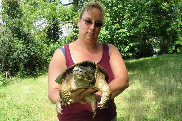 Me releasing a Snapping Turtle at Barrie's Lake