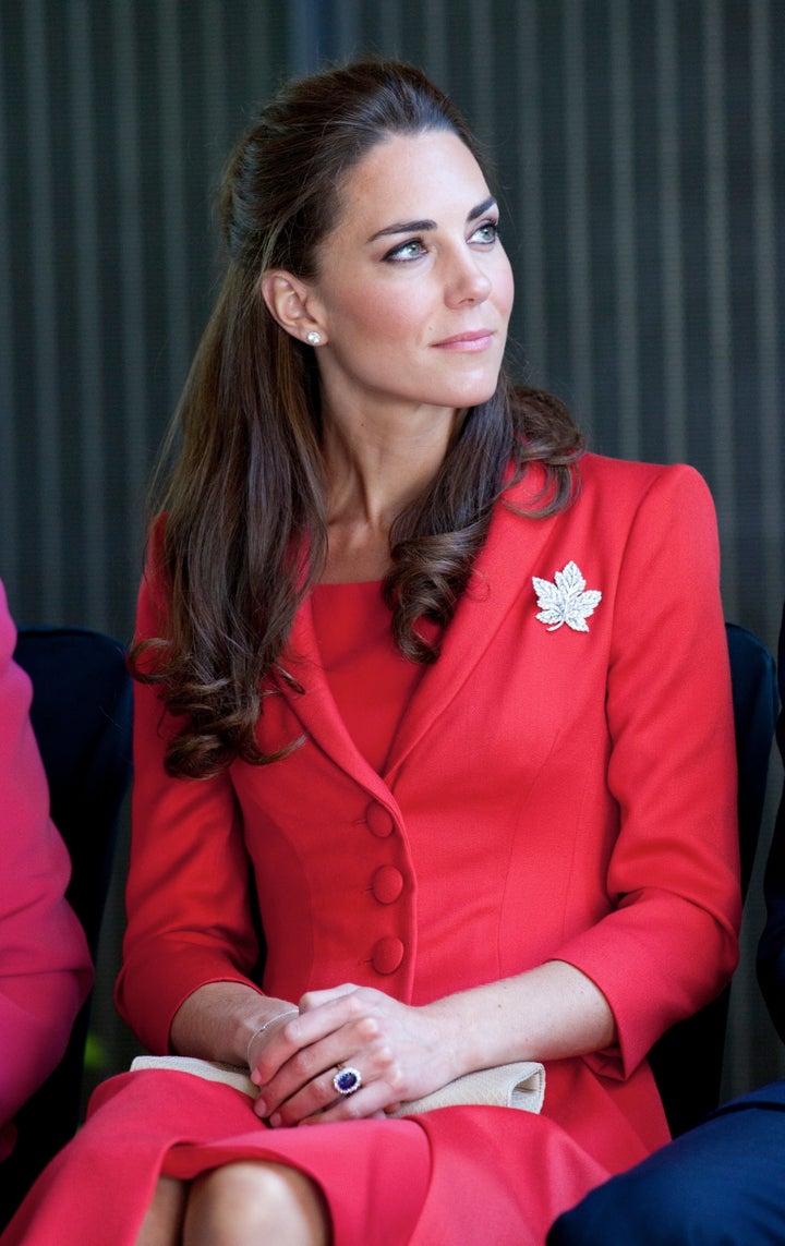 Kate wearing the pin (and red!) in 2011. 