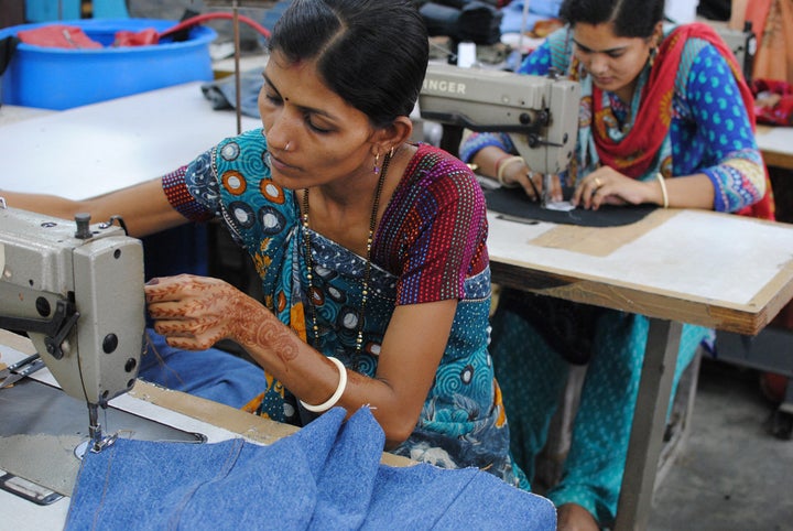 Women create Beyond Retro LABEL garments at its factory in India