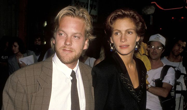 Kiefer Sutherland and Julia Roberts attend the "Flatliners" Hollywood Premiere on Aug. 6, 1990, in Hollywood, California.