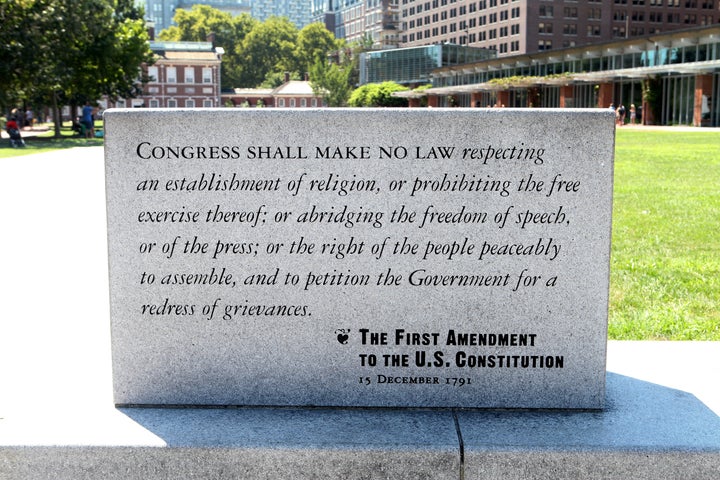 A marble plaque reading of The First Amendment To The U.S. Constitution sits on Independence Mall in Philadelphia, Pennsylvan