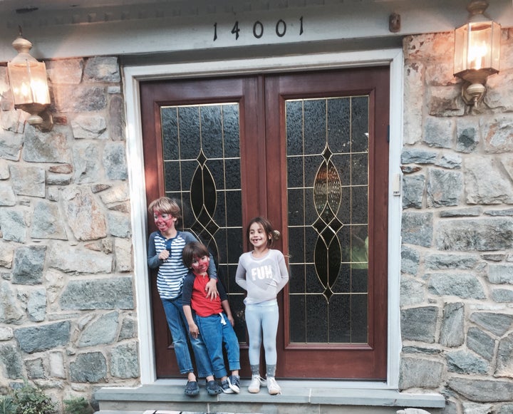 My children outside my childhood home.