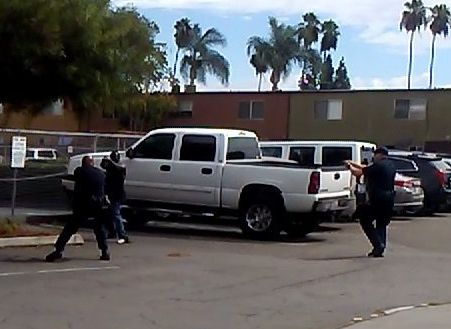 A screengrab of a deadly confrontation between a black man and El Cajon police officers.