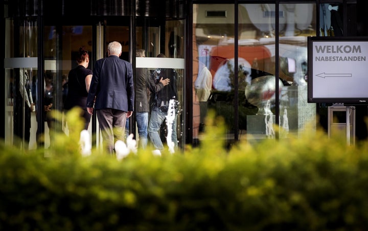 Relatives of the MH17 victims arrive at the NBC Congress centre in Nieuwegein on Wednesday.