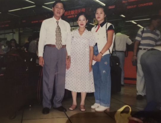 The family before they departed Hong Kong for the U.S. in 1995