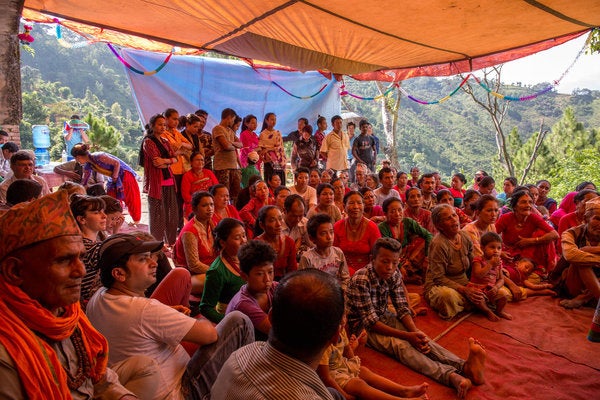 Community and Water Aid workers gather for the world premiere of their film