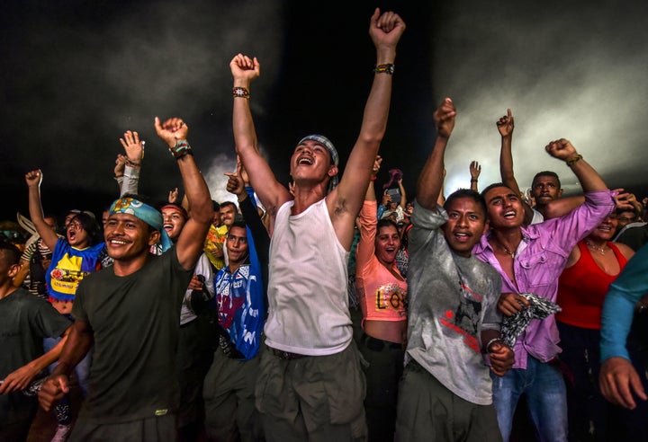 FARC rebels dance during a cultural event held at their encampment in Llanos del Yari. Sept. 21.