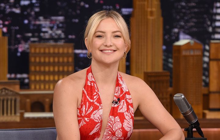 Kate Hudson says she forgives her biological father, who once declared her "dead" to him.