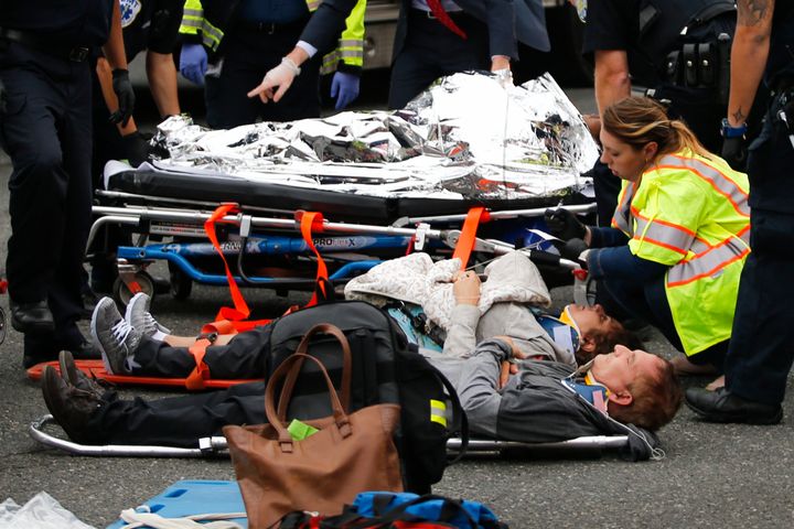 <strong>People are treated for their injuries on the street outside</strong>