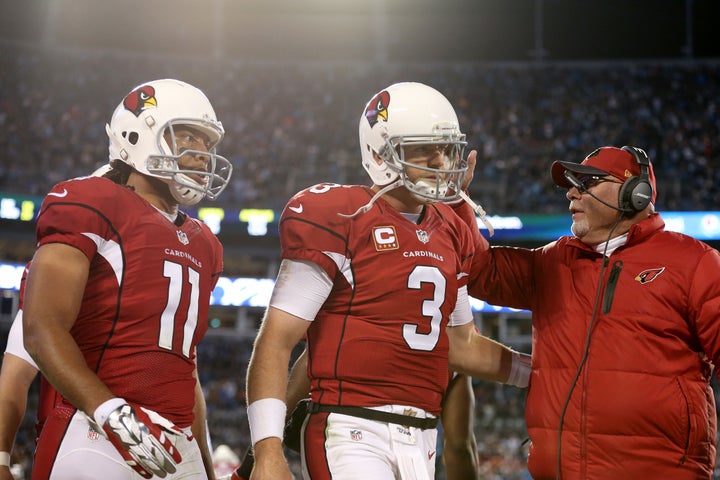 It's far too early to panic on Larry Fitzgerald (left), Carson Palmer and head coach Bruce Arians.