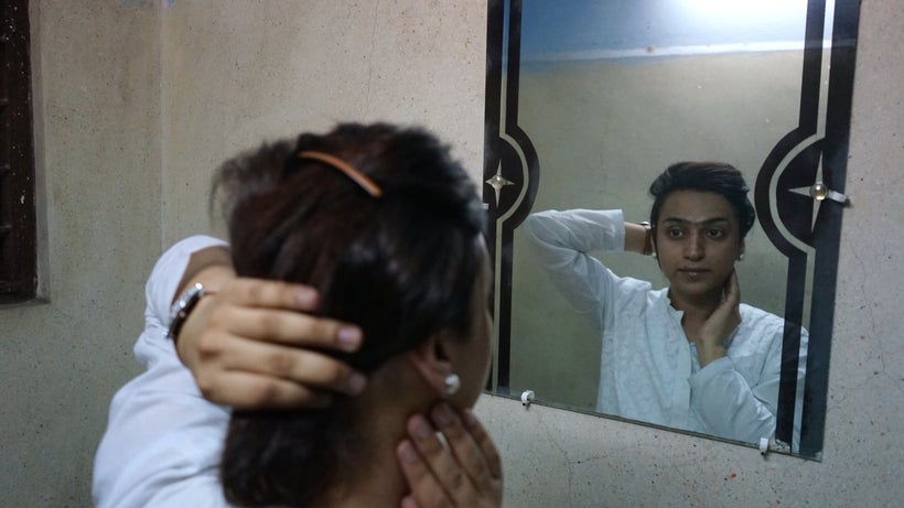 Jannat takes a look in the mirror.