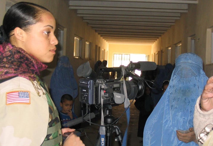 <p>Oct. 2004 -- Mary Simms interviews women in the Raban village in Afghanistan</p>