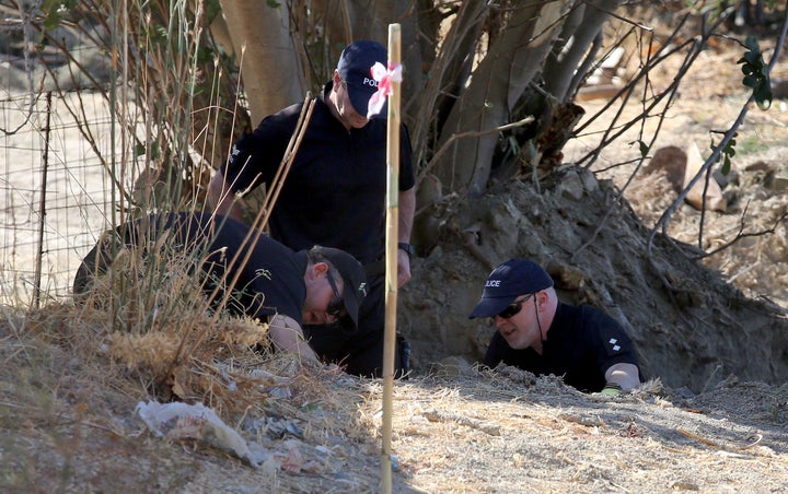 <strong>Detective Inspector Jon Cousins (right) of South Yorkshire Police in Kos, Greece, as officers from South Yorkshire Police continue excavations</strong>