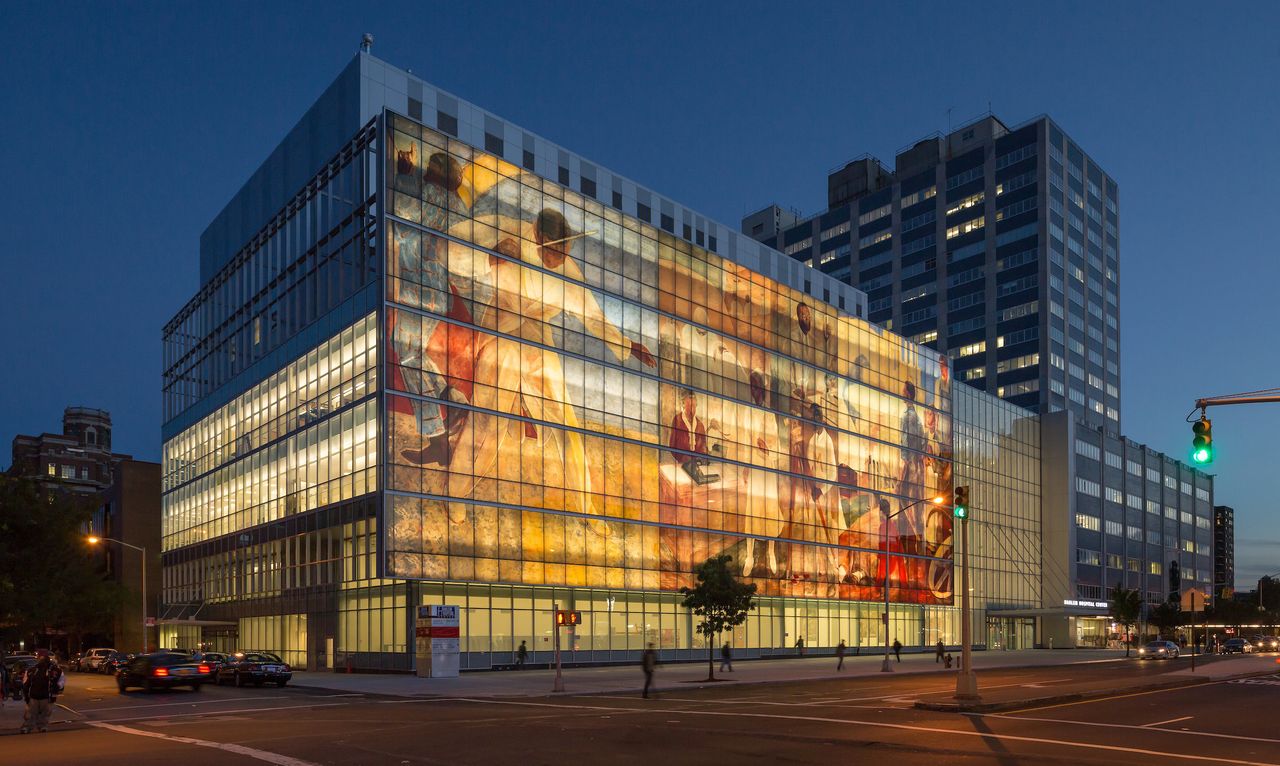 Harlem Hospital Center's Mural Pavilion facade replicates three panels from the 1937 "Pursuit of Happiness" mural by Vertis Hayes, a celebration of black culture.