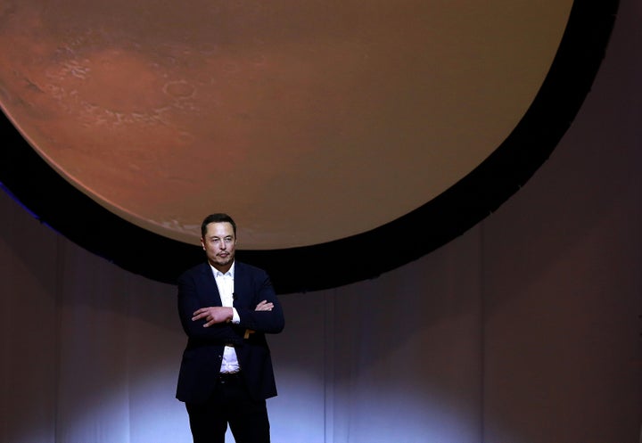 Elon Musk, chief executive officer for Space Exploration Technologies Corp. (SpaceX), pauses while speaking during the 67th International Astronautical Congress (IAC) in Guadalajara, Mexico, on Tuesday, Sept. 27, 2016. Musk's vision for building a self-sustaining city on Mars will require full rocket reusability, refueling the spacecraft in orbit and propellant production on the Red Planet.