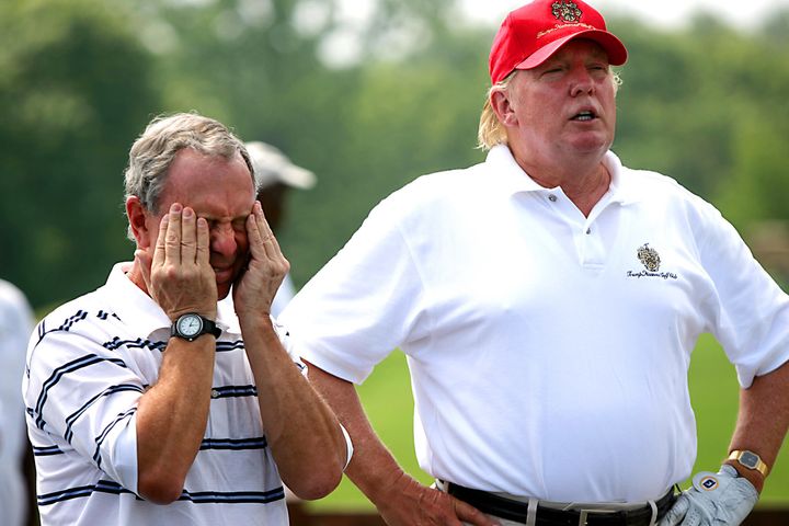 GOP presidential nominee Donald Trump plays golf with former New York City Mayor Michael Bloomberg at a charity event in 2012. Trump's recent increase in his stated height allowed to escape the "obese" label using the body mass index calculator.