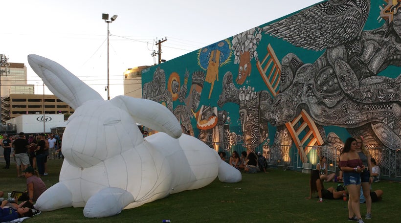 An Amander Parer rabbit makes itself at home beside a Zio Ziegler mural.
