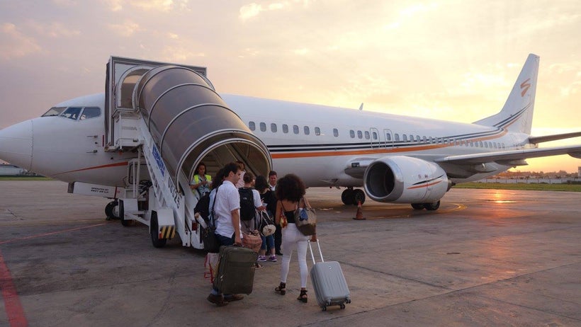 CubaOne trip participants sunset at Jose Marti International Airport in Havana, Cuba.