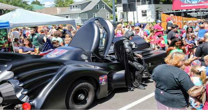 Heroes 4 Higher founder John Buckland is seen dressed as Batman with his Batmobile.