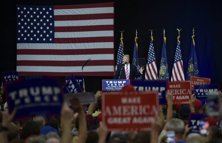 Republican presidential nominee Donald Trump tells his audience in Manheim, Pennsylvania, Saturday that he pays for his campaign with his own money and with small donations. His statement is not true.