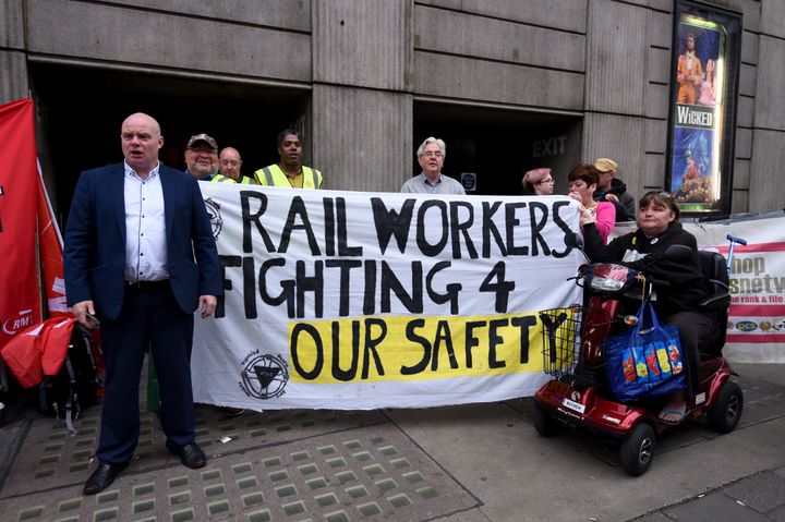 Southern Rail employees and union members take part in a strike against their company working practices on September 7.