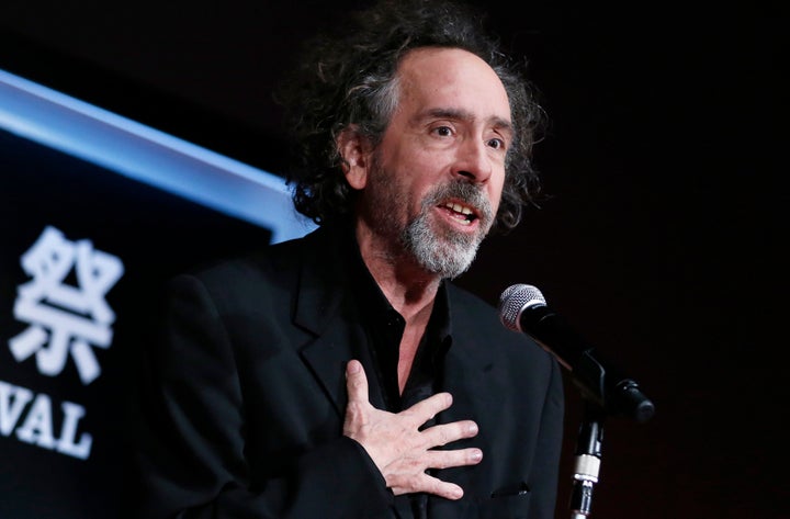 Director Tim Burton speaks as he receives the SAMURAI award during the closing ceremony of the Tokyo International Film Festival in Tokyo October 31, 2014.