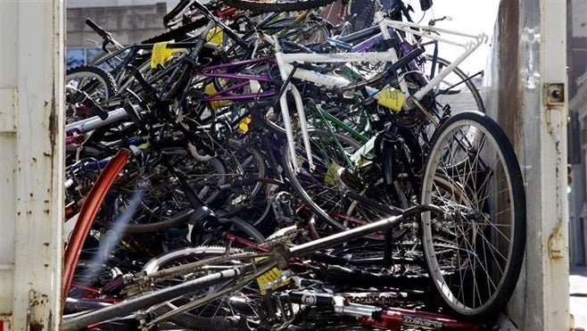 Some cities are turning an eyesore into money by taking abandoned bikes and auctioning them off, while others are giving them