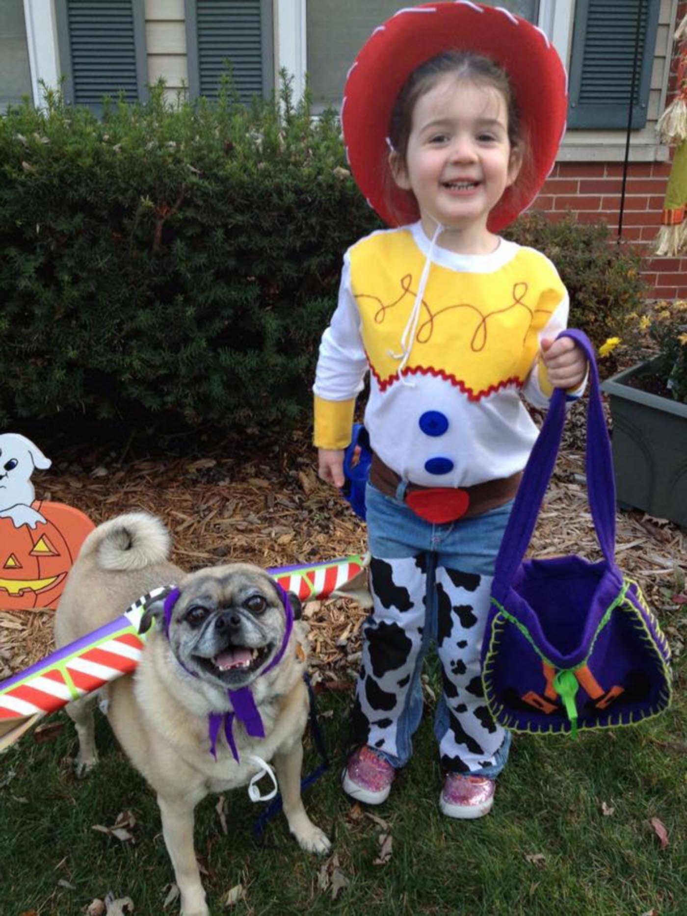 family costumes with baby and dog