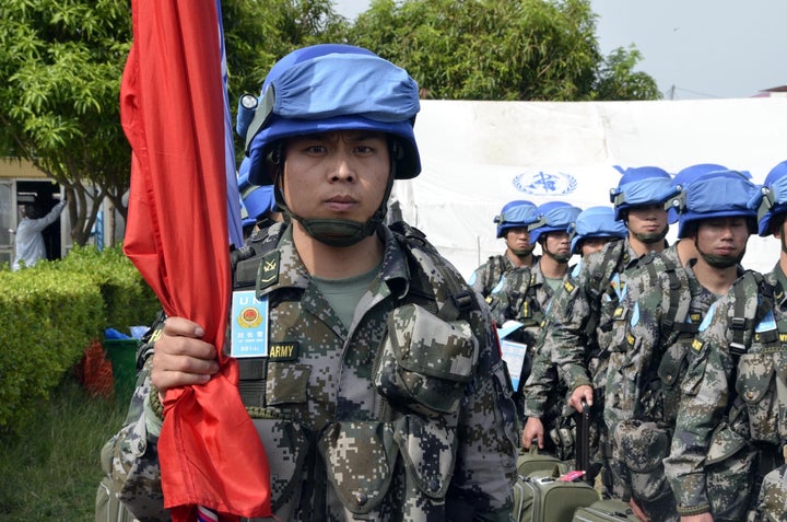 One-hundred and thirty Chinese peacekeeping troops arrive at Juba International Airport on April 8, 2015, as part of a U