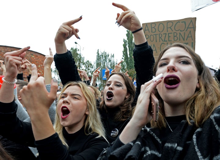 Polish women take part in a nationwide strike and demonstration to protest against a legislative proposal for a total ban of abortion on October 3, 2016 in Warsaw.