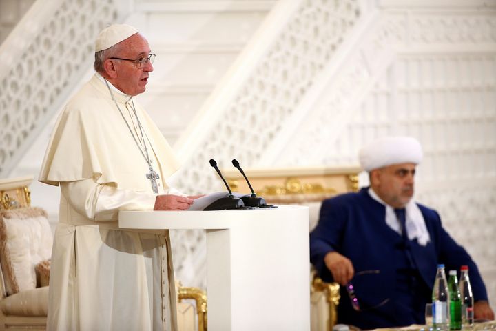 Pope Francis talks during a meeting with Azerbaijan's Grand Mufti Allahshukur Pashazade at the Heydar Mosque in Baku, Azerbaijan Oct. 2.