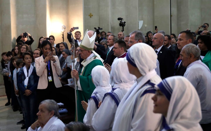 Pope Francis arrives to celebrate a mass in the Immaculate church in Baku, Azerbaijan, on Oct. 2.