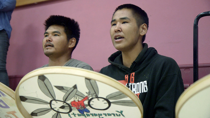 Newtok students practice traditional Yup’ik drumming after school.