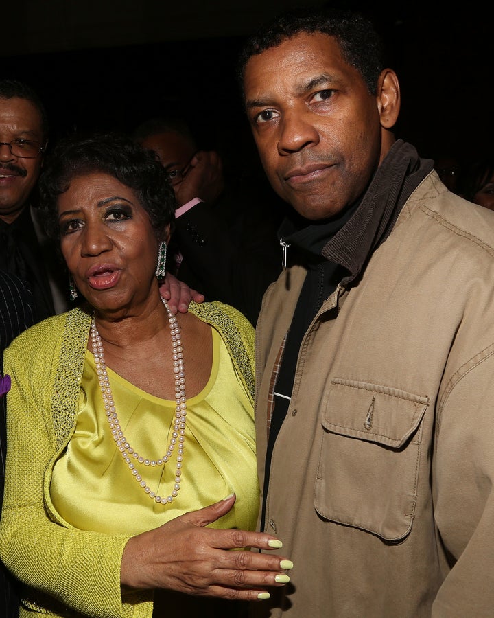 Aretha Franklin and Denzel Washington at Franklin's 72nd birthday celebration on March 22, 2014, in New York City.