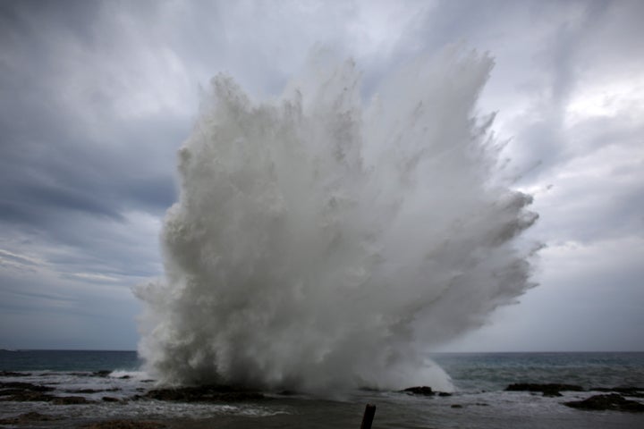 A wave splashes on the beach at Siboney ahead of the arrival of Hurricane Matthew, Cuba, October 4, 2016.