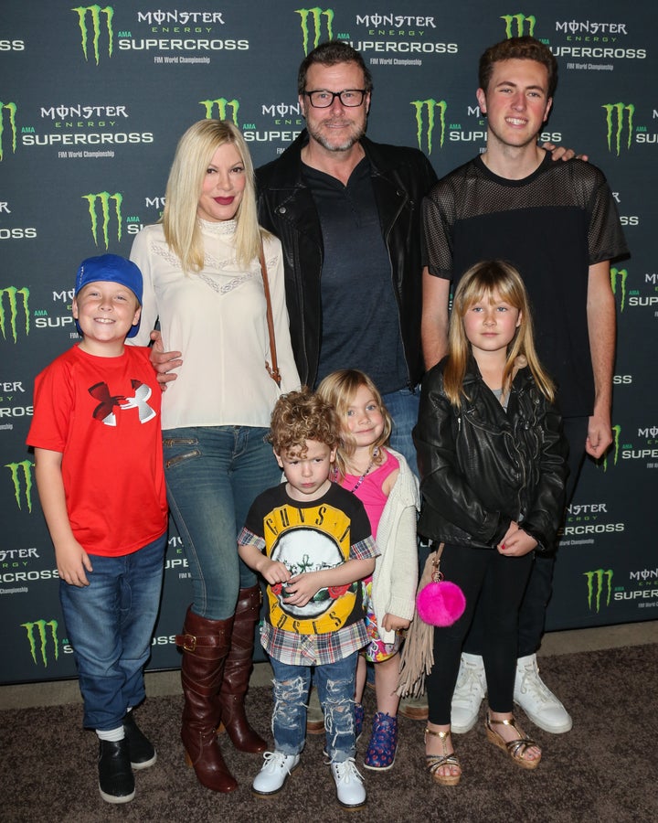 Tori Spelling and her Husband Dean McDermott with their kids attend the Monster Energy Supercross on Jan. 23, 2016, in Anaheim, California.