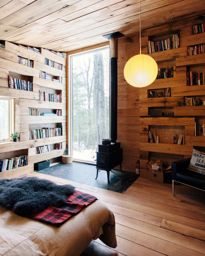 Books line the walls.