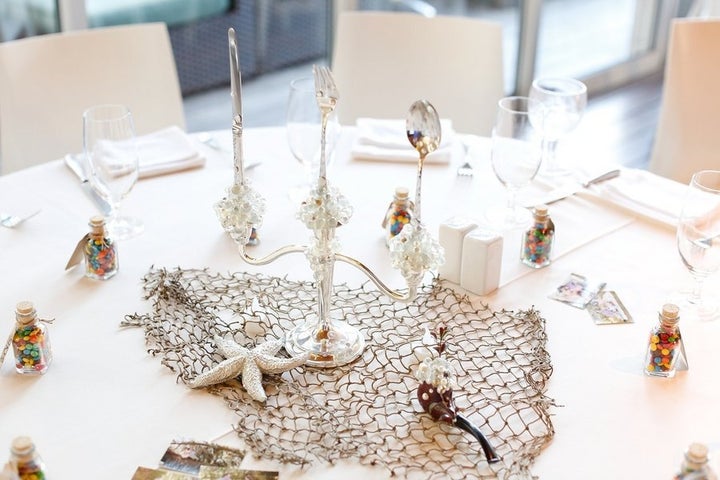 "Little Mermaid" table with a dinglehopper (fork), Snarfblatt (pipe) and other nautical nonsense.