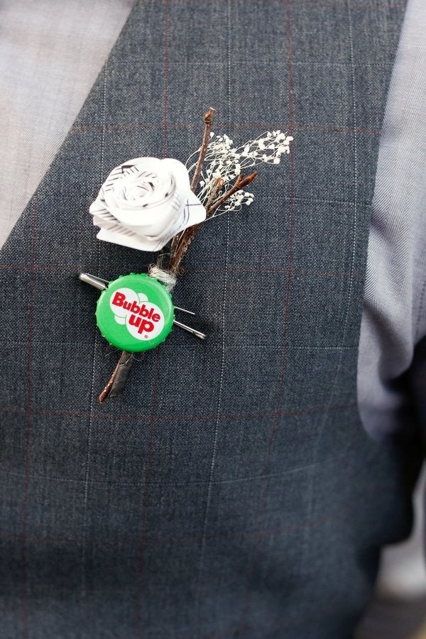 The groom and groomsmen rocked bottle cap boutonnières. 