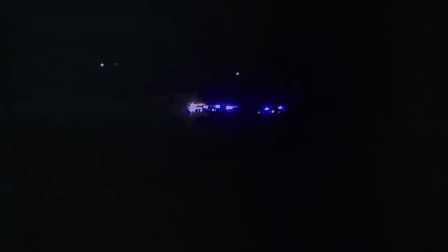 Cops shining their lights.