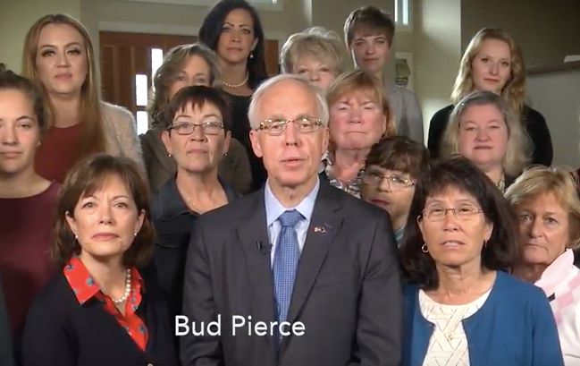 Bud Pierce shows he stands with women by literally standing with women.