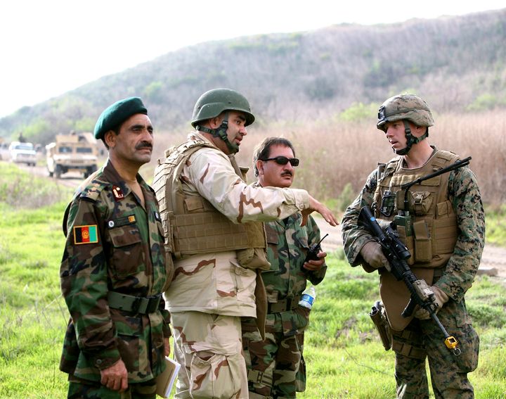 Afghan national army officers discuss lessons learned alongside Marines and Navy personnel while participating in combat scenario training exercises at U.S. Marine Corps Base Camp Pendleton in California. Dozens of Afghan troops have now gone missing.