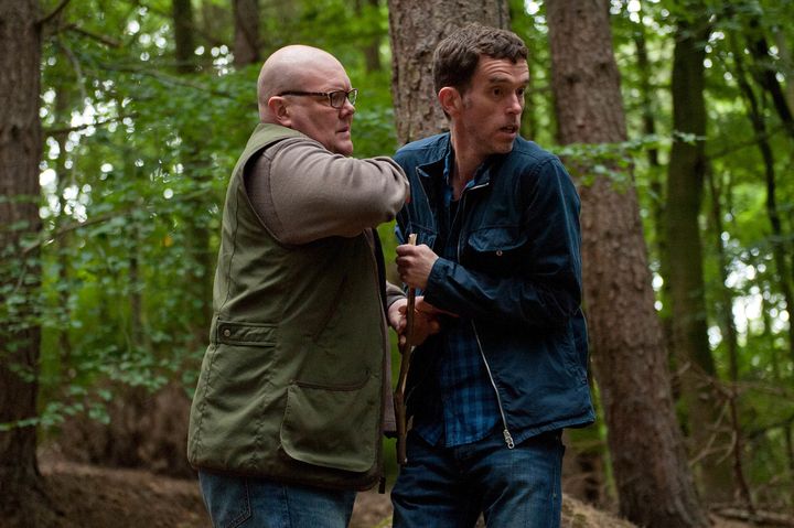 Paddy and Marlon are alarmed when they hear someone in the woods (then relieved when it's Rhona...) 