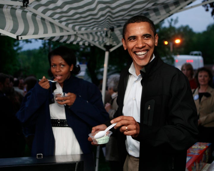 Obama eating ice cream and so happy about it.