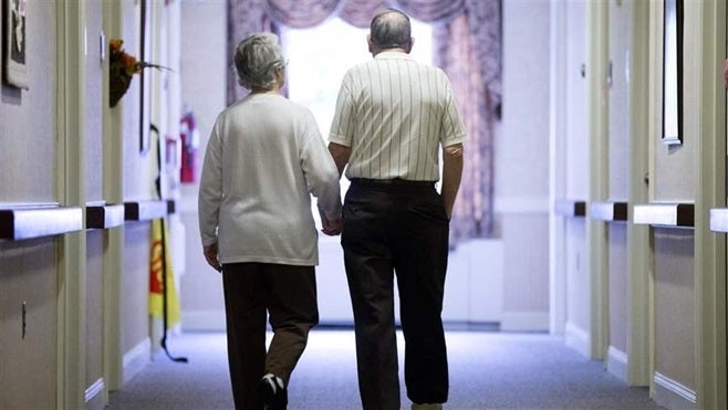 An elderly couple in Easton, Pennsylvania. Some older retirees are finding that Snow Belt states, where their families live, may be more to their liking than the sunny states they first retired to.