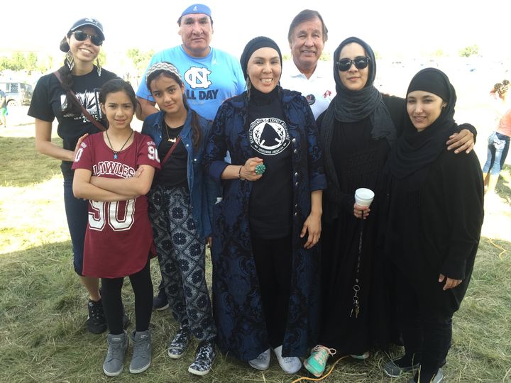Leslie Henderson Oajaca (front row, second from right) stands with a group of indigenous Muslims who visited Sacred Stone Camp in September. The gentleman in the white t-shirt is a friend.