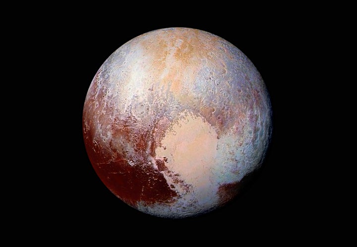 This NASA photo of Pluto was made from four images by New Horizons' Long Range Reconnaissance Imager (LORRI), combined with color data from the Ralph instrument.